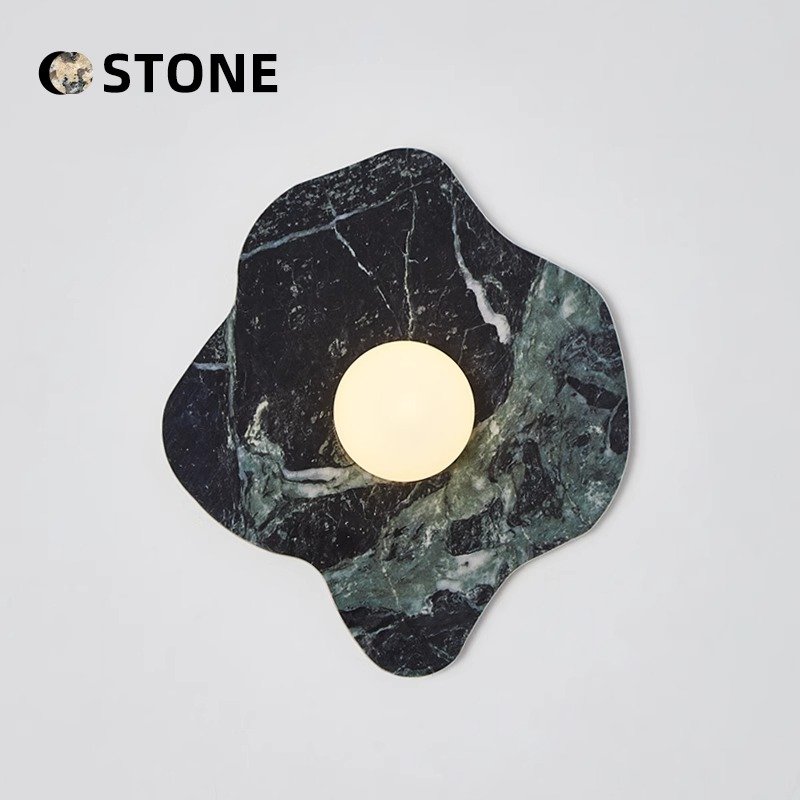Stone-effect wall light sample for interior lighting collection